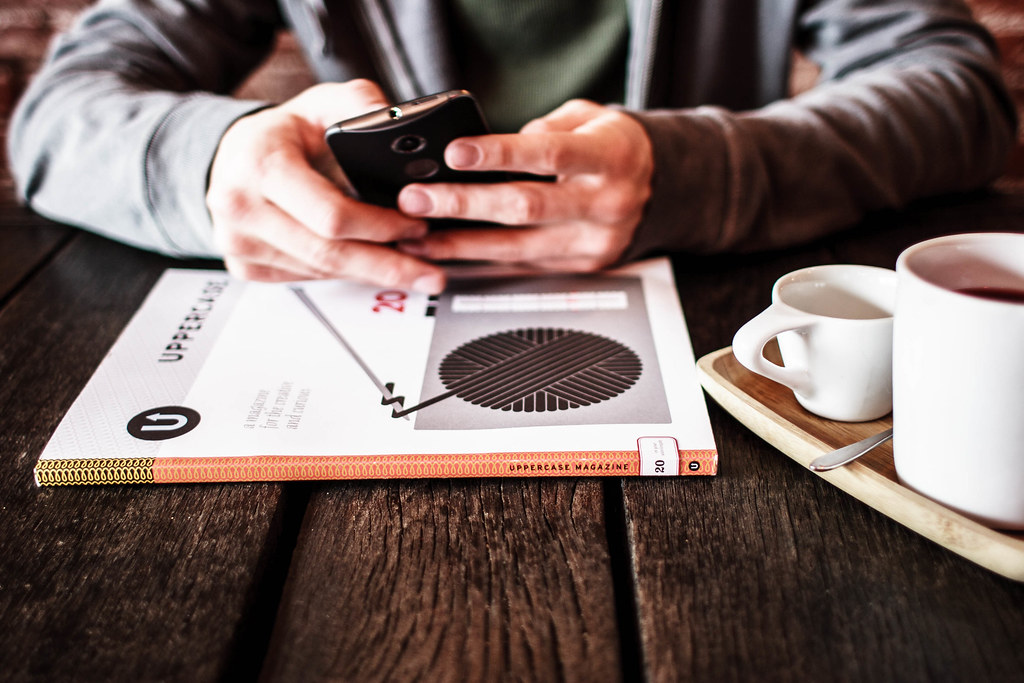 Canadian confidently using smartphone to apply for an emergency loan